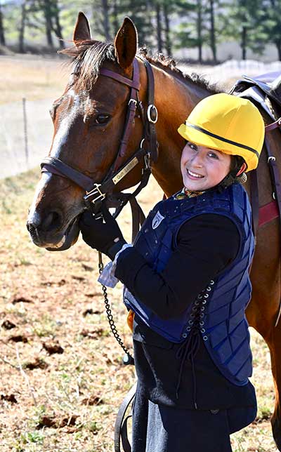 warrenton hunt races sidesddle rider hugging horse