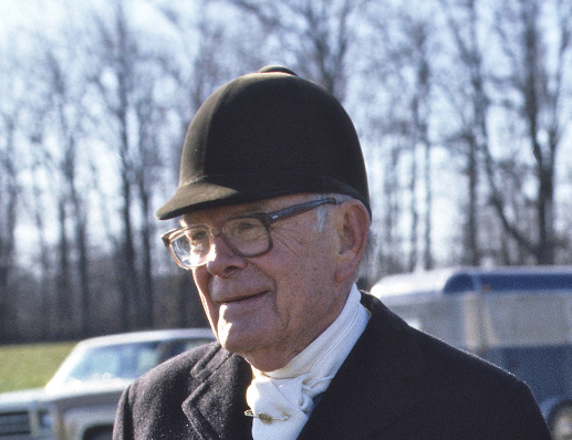 Man with glasses and hunt cap