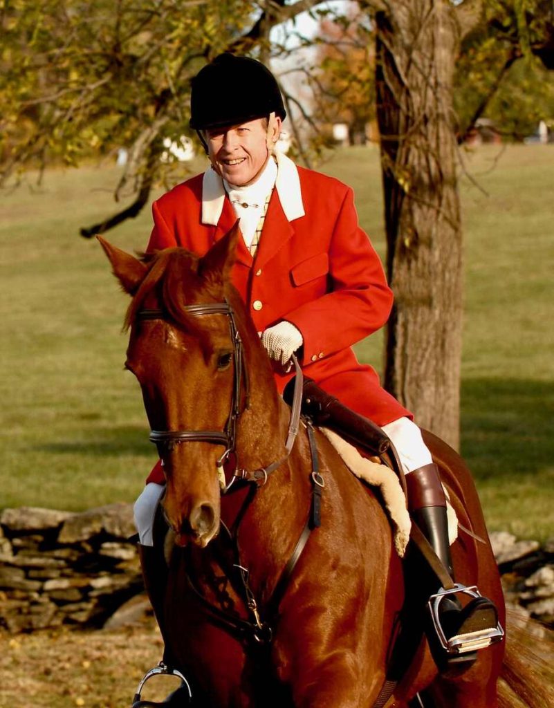 Master Bill Prime, man in red hunt coat on a horse